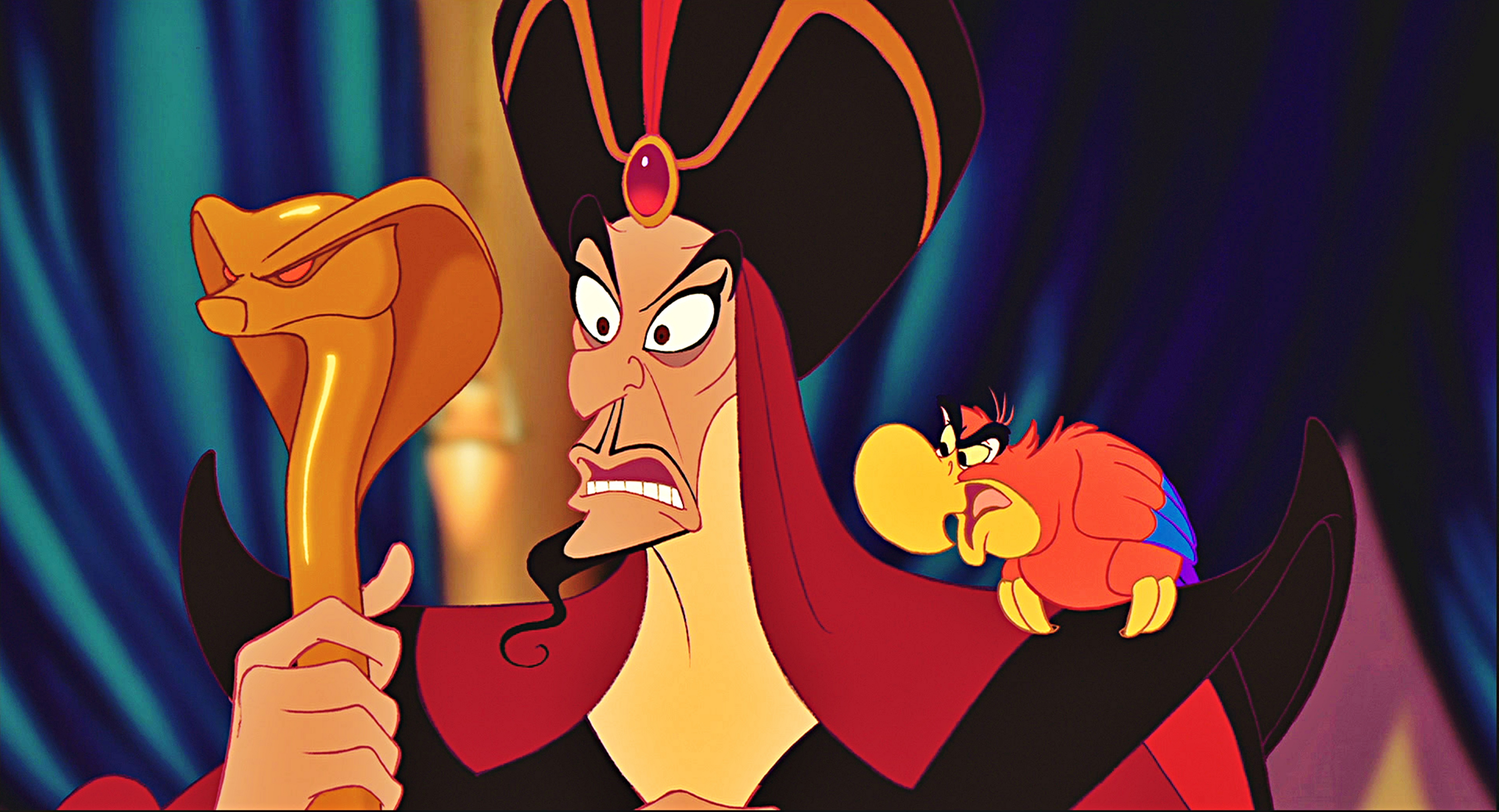 Trollkarlen Jafar från Aladdin med sin ormstav av guld och papegojan Jago på sin axel